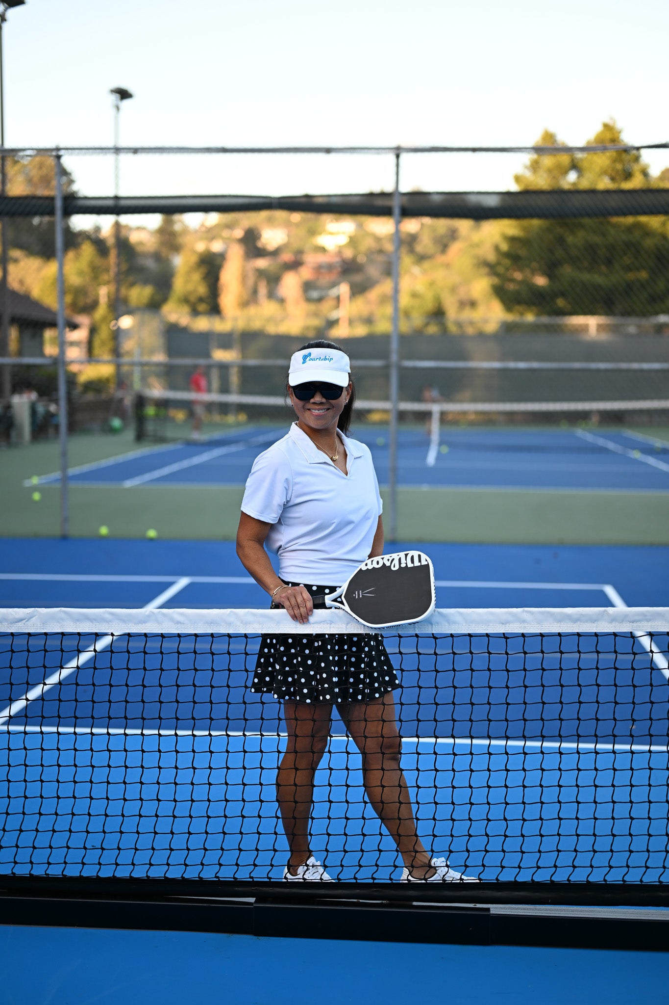 PLAYFUL YET POLISHED, THE WENDY SKIRT IS A POLKA-DOT SKORT MADE FOR THE COURSE, THE COURT, AND ALL THE MOMENTS IN BETWEEN.